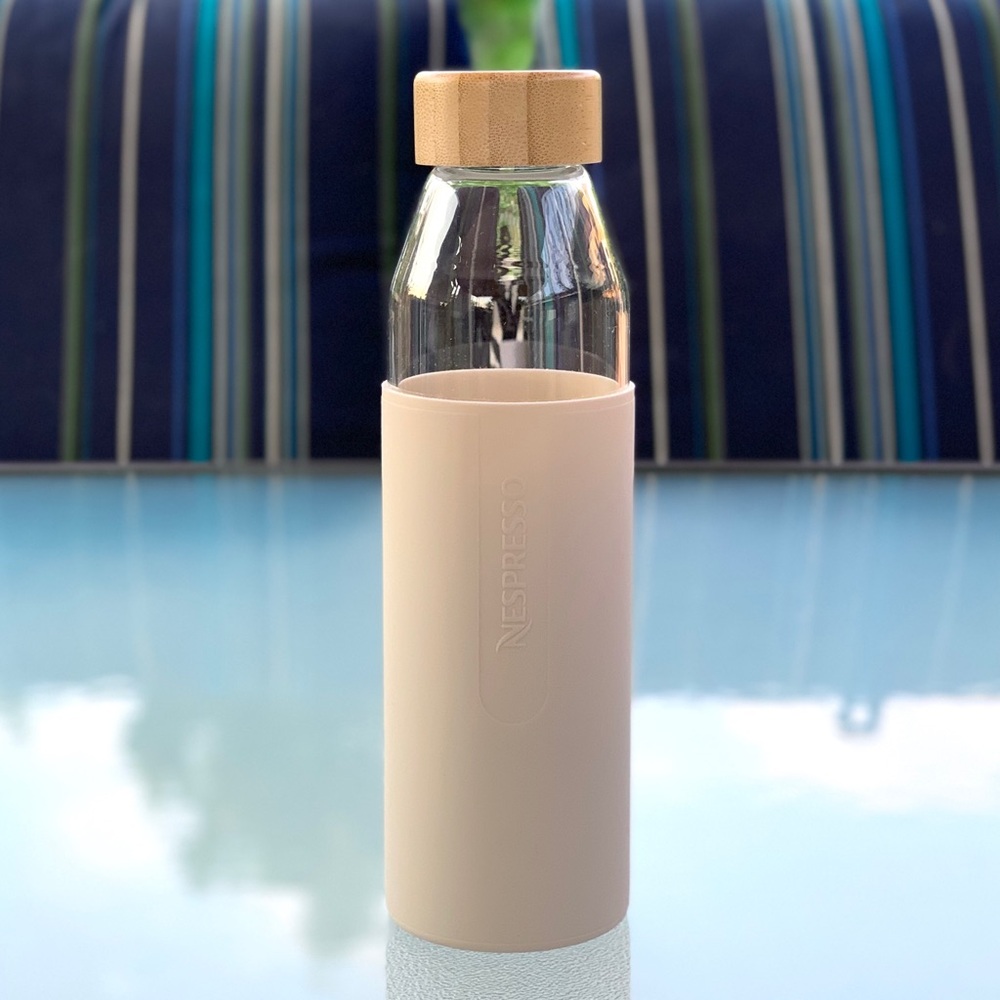 Nespresso Glass Cold Beverage/Water Bottle with Light Beige Silicon Sleeve